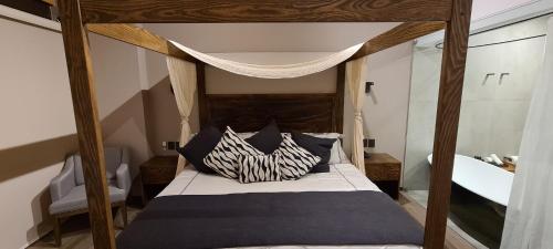 Quinta Tere Hotel & Galleryにあるベッド