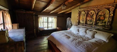 Postel nebo postele na pokoji v ubytování Quinta Tere Hotel & Gallery