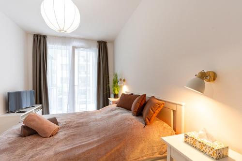 Posteľ alebo postele v izbe v ubytovaní Modern & Newly built apartment with private garage