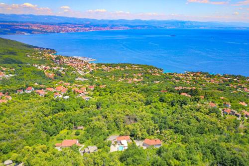 an aerial view of a town and the water at Apt - Villa Sambije with swimming pool, Dobrec - Opatija in Dobreć