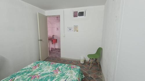 Ein Bett oder Betten in einem Zimmer der Unterkunft VAMO A ROLA