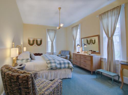 Ένα ή περισσότερα κρεβάτια σε δωμάτιο στο Prairie Guest House
