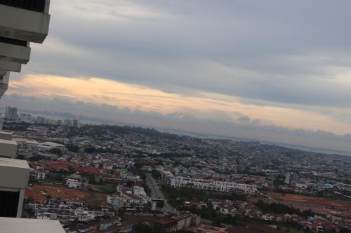 an aerial view of a city with buildings at Galeno Pollux Habibie in Batam Center