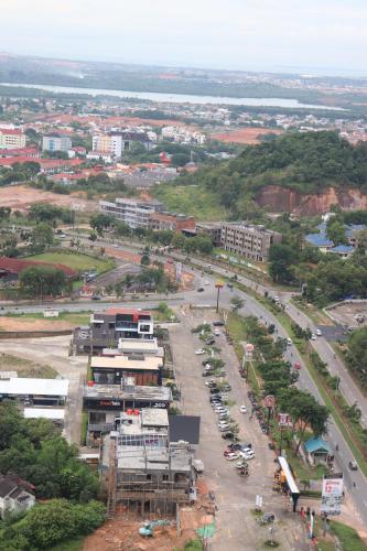 an aerial view of a city with a parking lot at Galeno Pollux Habibie in Batam Center