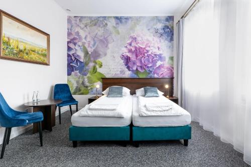 Кровать или кровати в номере Hotel i Restauracja Nad Jeziorem