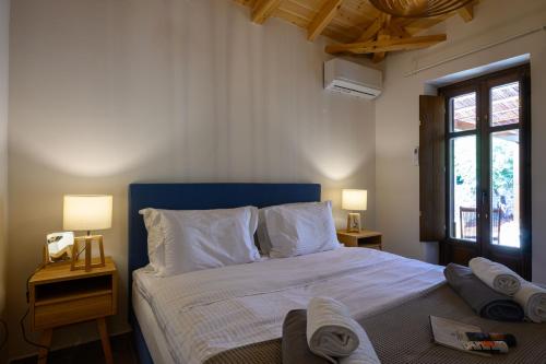 Ένα ή περισσότερα κρεβάτια σε δωμάτιο στο Aloni Ekies