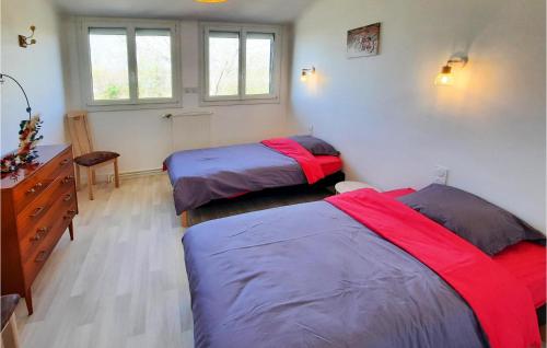 Ein Bett oder Betten in einem Zimmer der Unterkunft Amazing Home In Allaire With Wifi