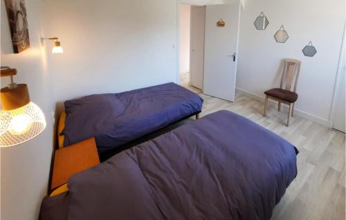 Ein Bett oder Betten in einem Zimmer der Unterkunft Amazing Home In Allaire With Wifi