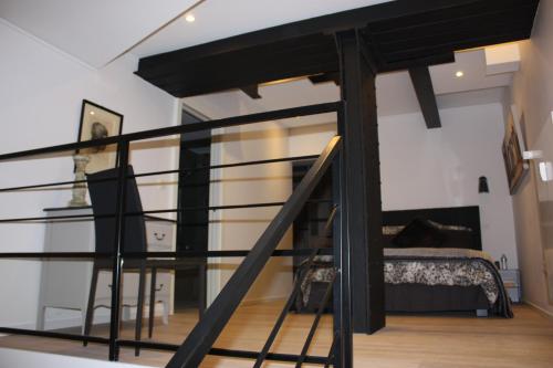 Palanda nebo palandy na pokoji v ubytování Appartement Saint Thomas Prestige