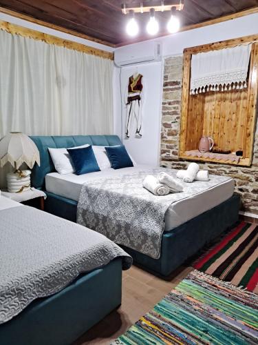 Кровать или кровати в номере "Villa 70" Guesthouse