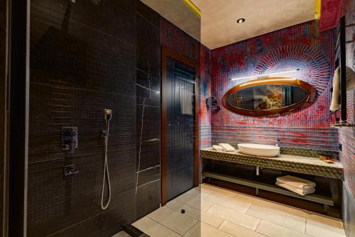 Phòng tắm tại Tapis Rouge Design Boutique Hotel