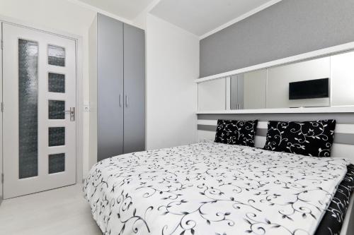 Posteľ alebo postele v izbe v ubytovaní Apartmentrent