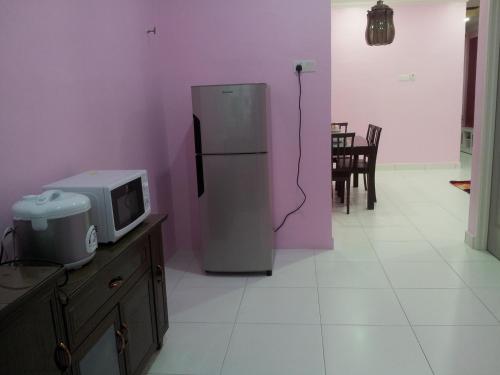 Η κουζίνα ή μικρή κουζίνα στο Aalisha Pulau Langkawi House