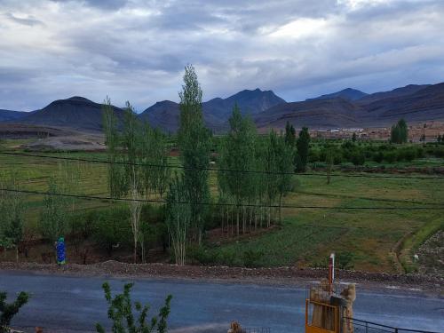 a view of a river with mountains in the background at Auberge restaurant Afoud in Agoudal