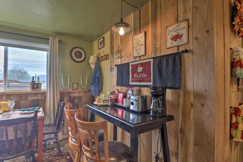 a kitchen with a counter and a table with a coffee maker at Flathead Lake-View Studio 38 Mi to Blacktail in Big Arm