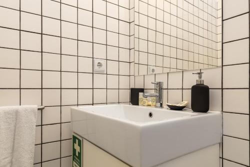 Kylpyhuone majoituspaikassa LISBON'S NEIGHBOURS APARTMENT