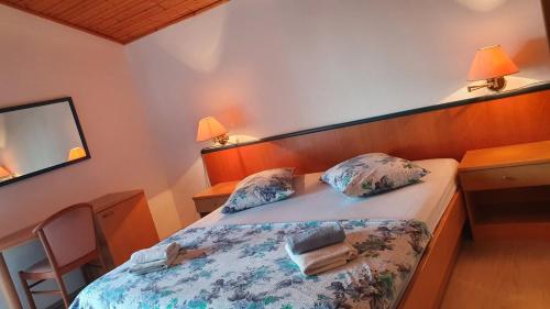 Postel nebo postele na pokoji v ubytování Apartment Mia