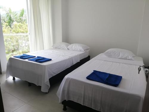Posteľ alebo postele v izbe v ubytovaní Hermoso apartamento nuevo con estacionamiento gratuito