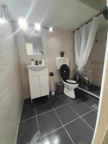 Un baño de Cocomelo Apts 2