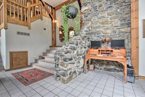 a stone building with a wooden desk in a room at Historic Helena Retreat - Near Dtwn and Mt Helena! in Helena