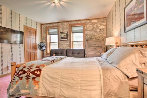 a bedroom with a large bed in a room at Historic Helena Retreat - Near Dtwn and Mt Helena! in Helena