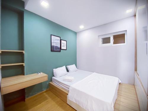 Кровать или кровати в номере MUONG THANH APARTMENT - 2BR