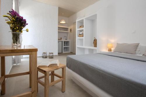 Postel nebo postele na pokoji v ubytování Vavoulas Village