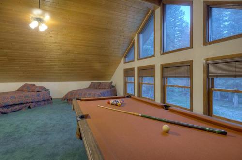 a large room with a pool table in it at Vallecito Family Retreat in Bayfield