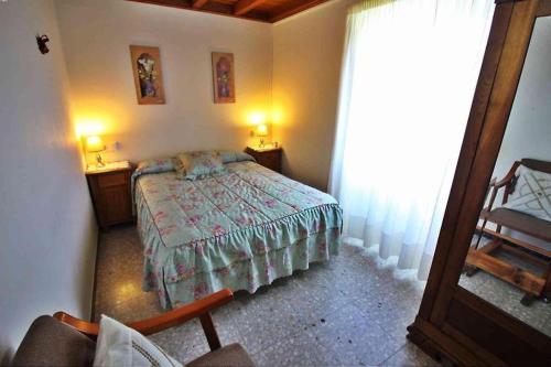 Ένα ή περισσότερα κρεβάτια σε δωμάτιο στο Casa Salgueiro