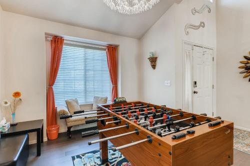 a large foosball table in a living room at 342 English Sparrow Dr in Highlands Ranch