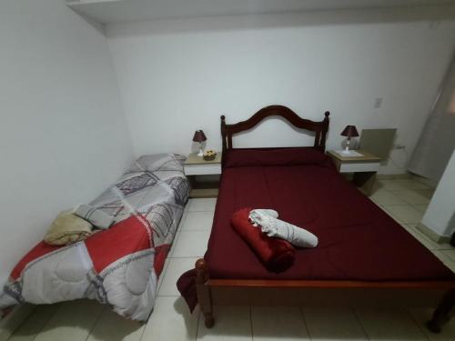 Una cama o camas en una habitación de Tym