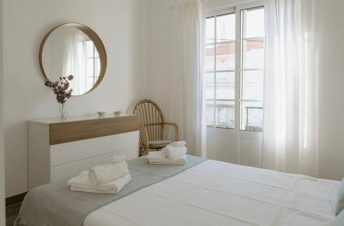 Кровать или кровати в номере Casa da Lota 1º