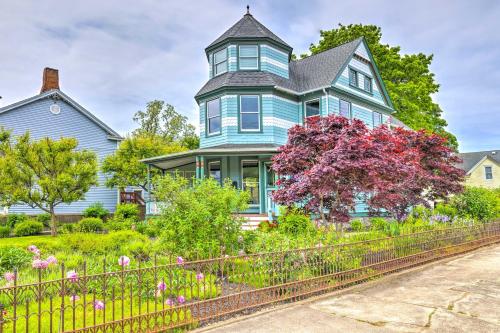 a blue house with a turret at Charming Greenport Gem 1, 1 Mile to Ferry! in Greenport