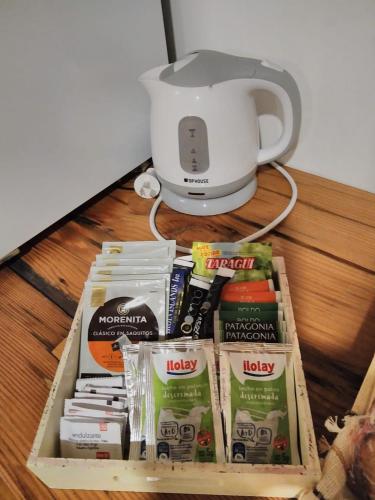a drawer filled with food and a coffee maker at El Jacal de San Pedro in San Pedro