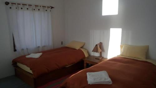 Letto o letti in una camera di Campo Santo