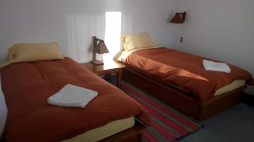 Letto o letti in una camera di Campo Santo