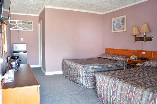 Postel nebo postele na pokoji v ubytování Bracebridge Inn