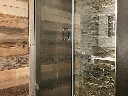 a shower with a glass door in a bathroom at Appartement Val-d'Isère, 4 pièces, 6 personnes - FR-1-518-87 in Val-d'Isère