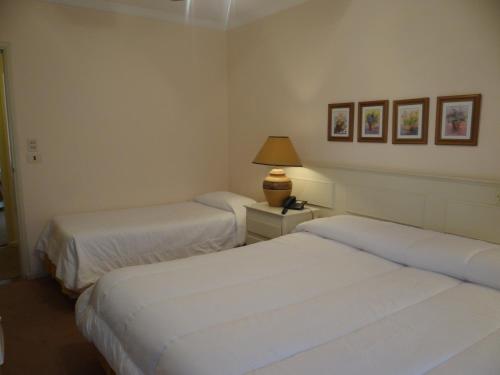 Katil atau katil-katil dalam bilik di Hotel Italiano