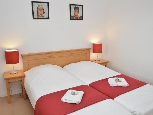 En eller flere senge i et værelse på Appartement Flaine, 3 pièces, 8 personnes - FR-1-425-125