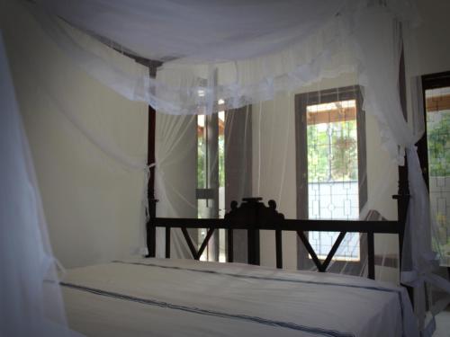 Ένα ή περισσότερα κρεβάτια σε δωμάτιο στο Singha Holidays