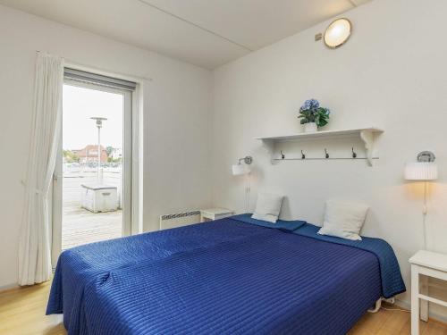 Postel nebo postele na pokoji v ubytování Holiday home Rudkøbing XIX