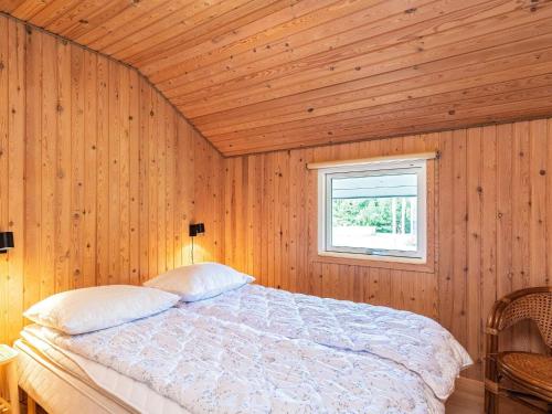 Ένα ή περισσότερα κρεβάτια σε δωμάτιο στο 8 person holiday home in Højslev-By Traum