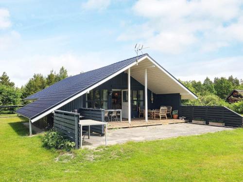 a house with solar panels on the roof at 8 person holiday home in Højslev-By Traum in Højslev