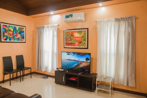 Photo de la galerie de l'établissement Shenanigans Glamping Resort, à Zamboanguita