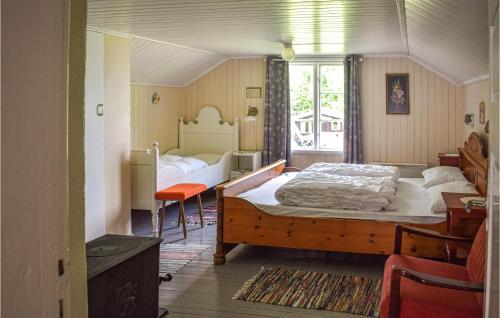 Postel nebo postele na pokoji v ubytování Haugholmen