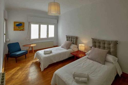 Posteľ alebo postele v izbe v ubytovaní Apartamento Santa Clara Girona