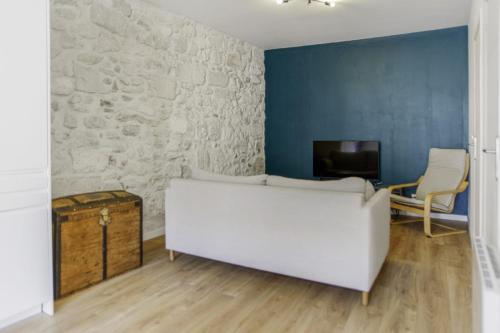 Televízia a/alebo spoločenská miestnosť v ubytovaní Appartement Ventoux - Welkeys