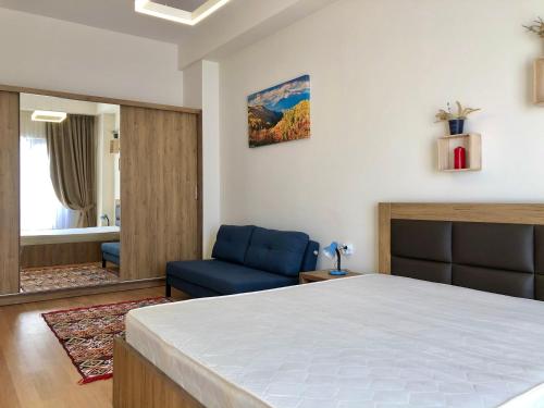 Кровать или кровати в номере GVC 2-room 116 New Gudauri