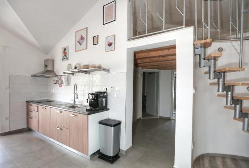 Kuchyň nebo kuchyňský kout v ubytování Apartment Tugare